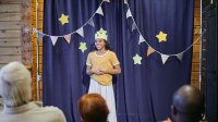 Photo of middle school student acting in play